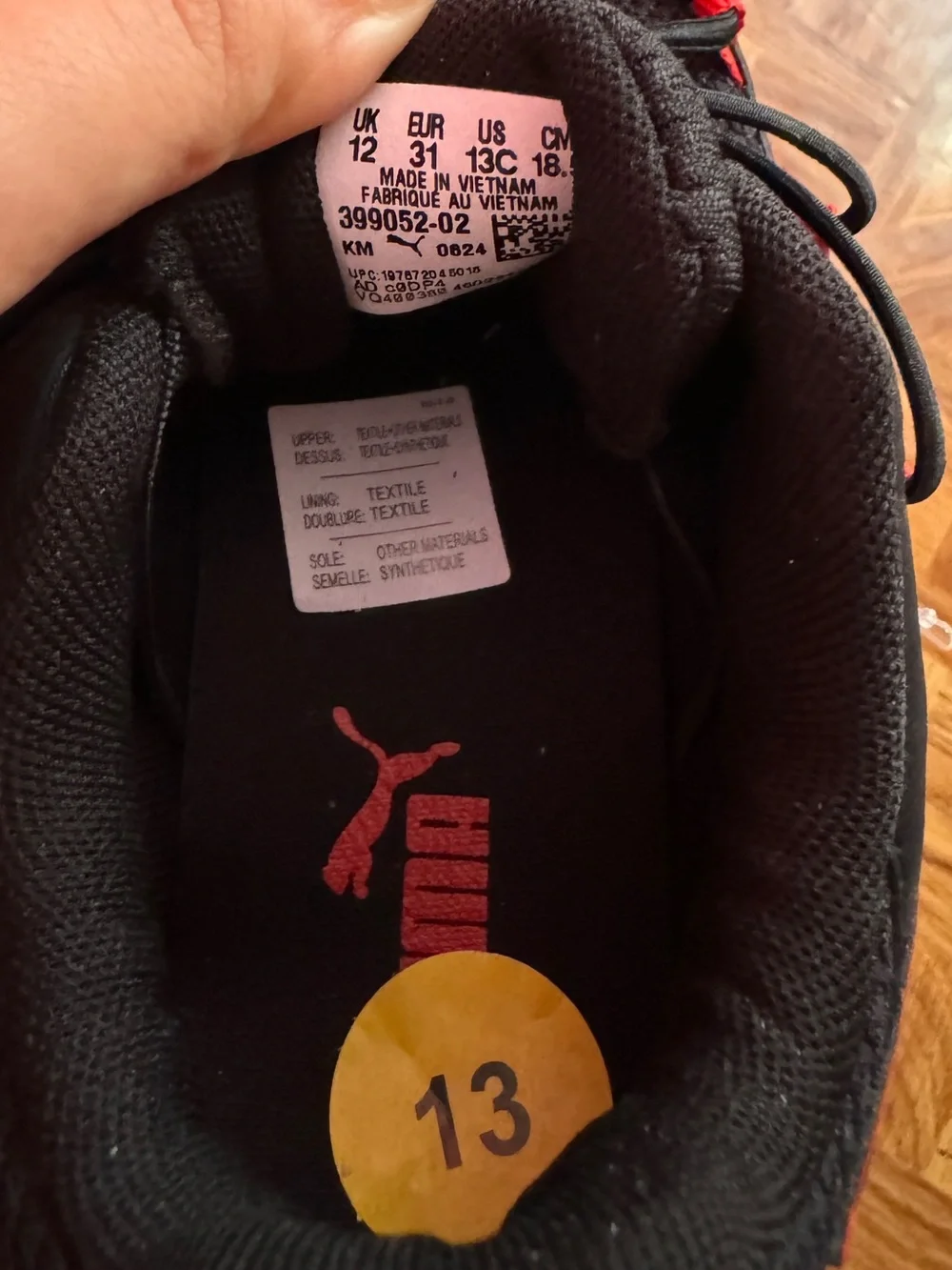 Puma Kids Black Sneakers with Red Accents